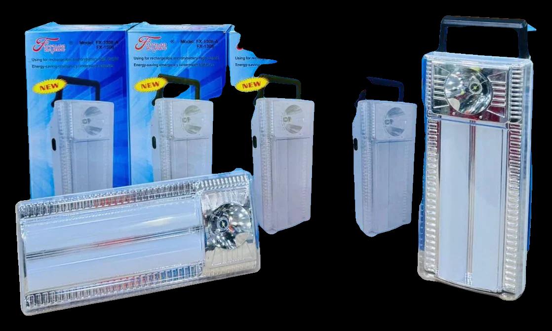 كشاف طوارئ Fuxuan FX-1308 بشمعتين ولمبة أمامية ويد للشيل بجوار علبته الزرقاء
